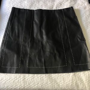 Faux leather skirt with dotted stitching and side zip size M